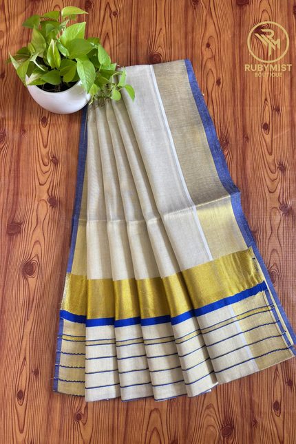 Stripe Patterned Tissue Saree.