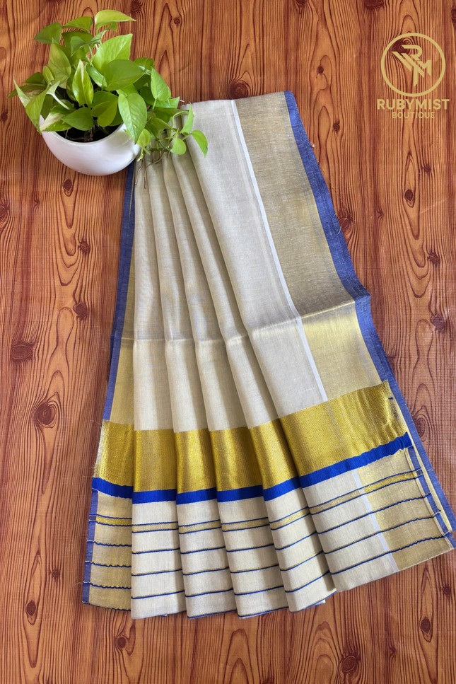 Stripe Patterned Tissue Saree.